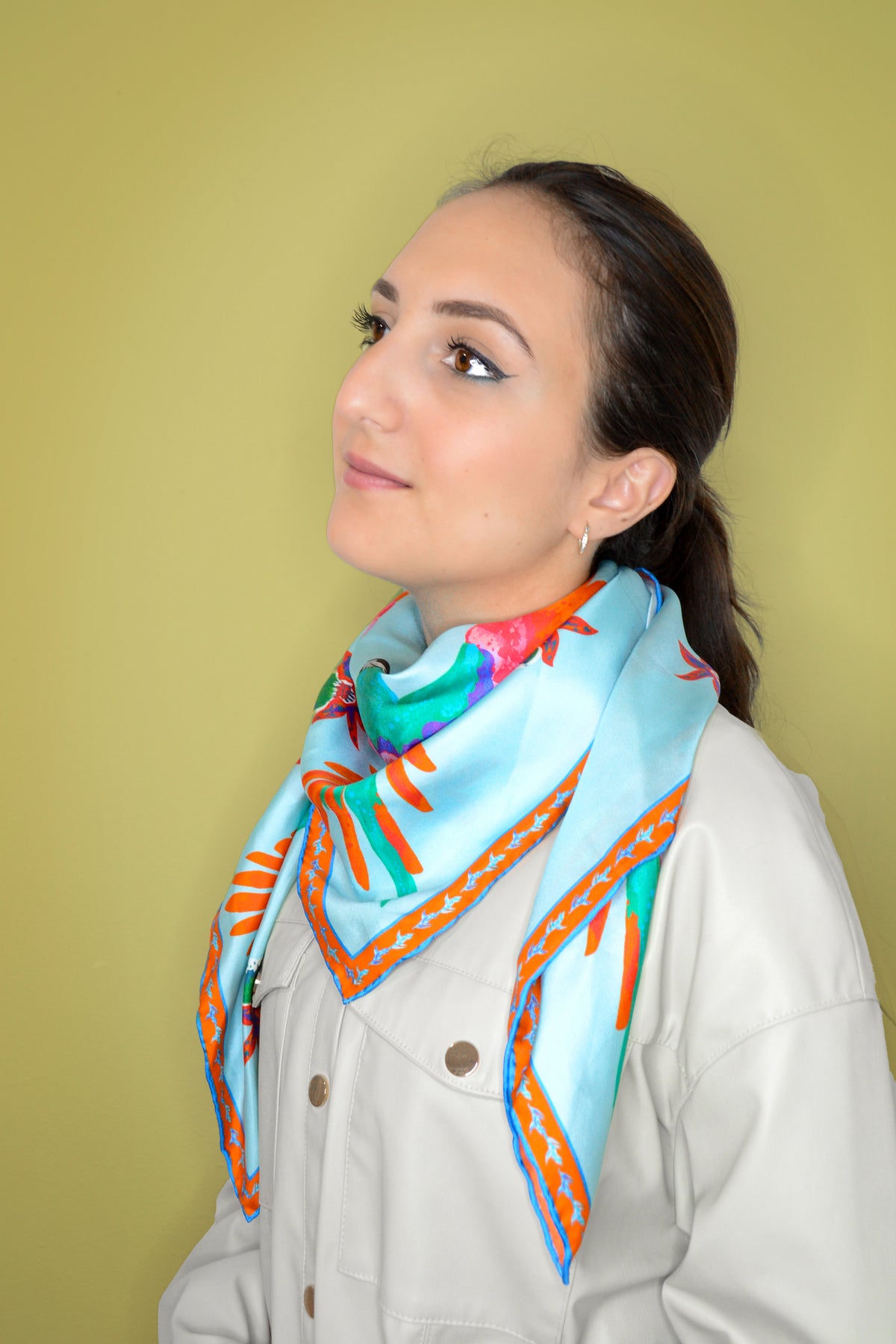 Fuego silk scarf detail — fiery sunset tones, hand-illustrated original artwork
